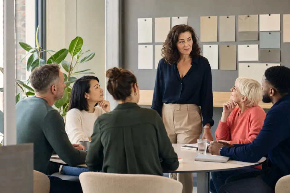 Colleagues discussing their work together